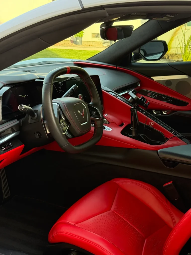 Clean red Corvette interior after an interior detail